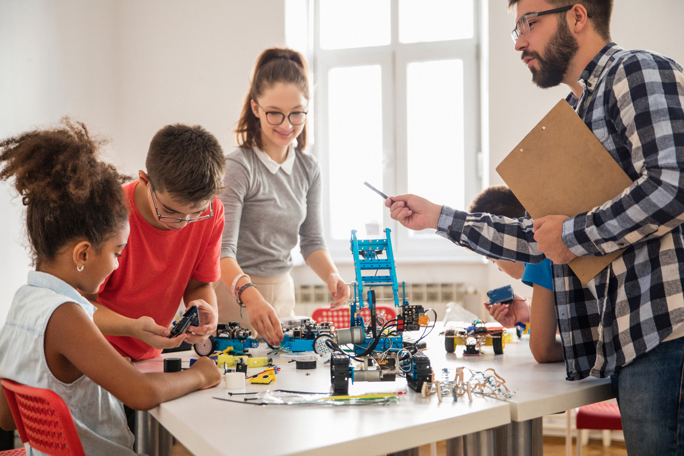 Kids working on a robot design